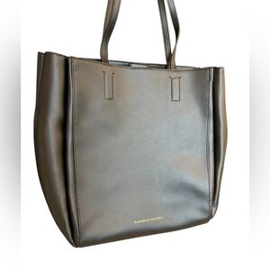 Danielle Nicole NWOT leather medium tote. Small interior stains manufacturer